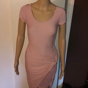 Super cute form fitting light pink dress